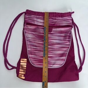 Puma Pink Drawstring Bag outside zipper pocket 1 inside zip pocket